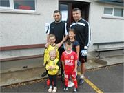 Darren McNamee Comber capt with his kids Jayden and Sienna and David with his kids Gracie and Jacob mascots for the day